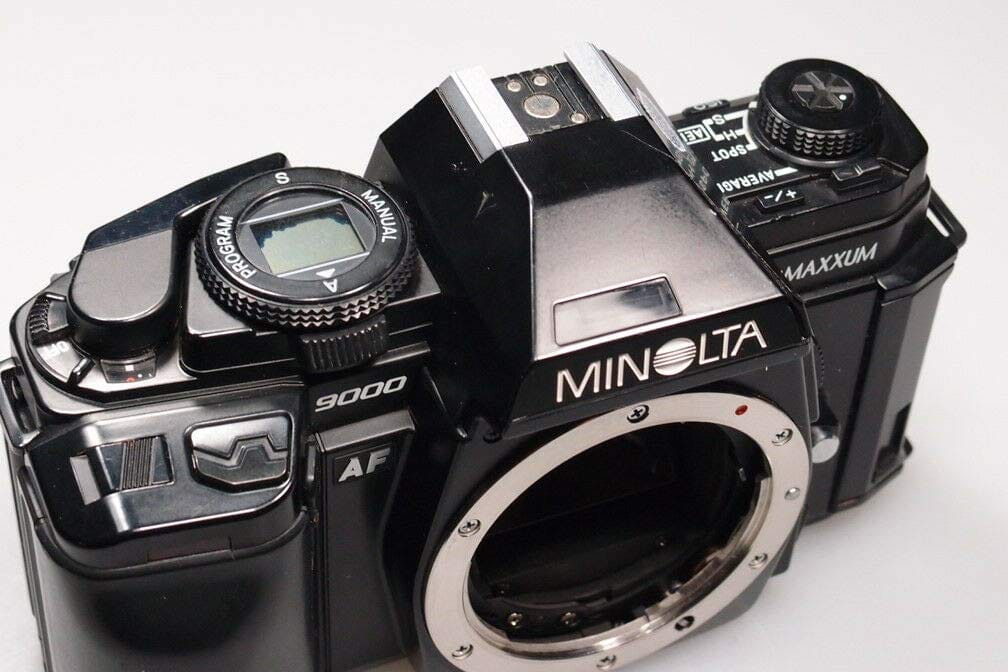 Konica Minolta Minolta Maxium 9000 35MM SLR Film camera with lens.