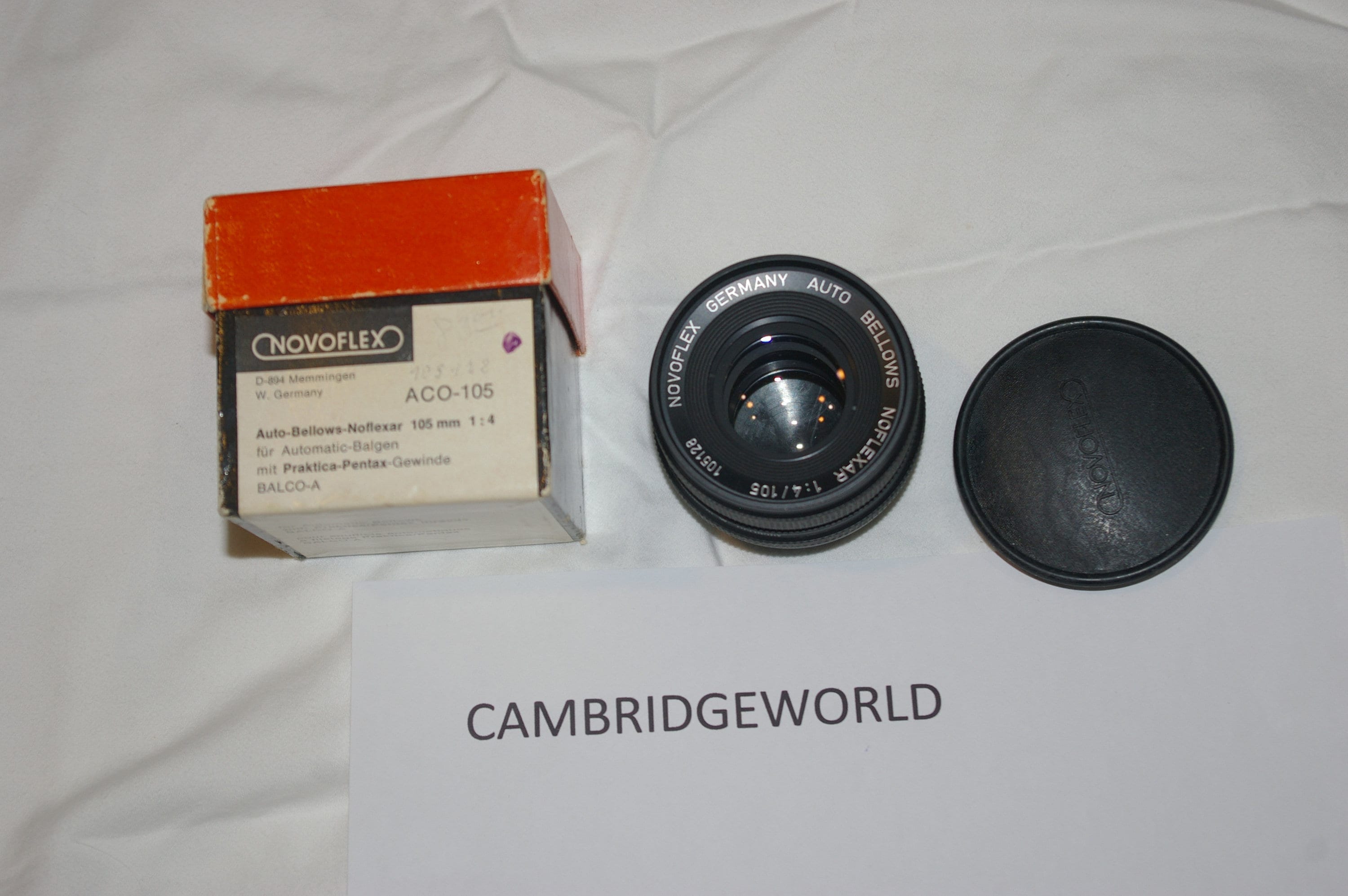 Novoflex NEW old stock Novoflex 105mm F4.0 auto short mount lens in Pentax M42 screw mount in box